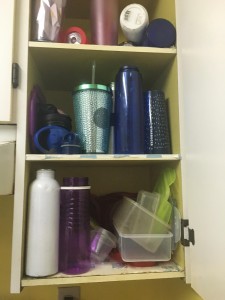 The cupboard where lost plastic containers with missing lids goes to die